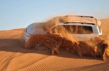 Evening Desert Safari with Camel Ride, BBQ Dinner and Dune Bashing