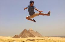 Camel Ride around the Pyramids During Sunrise Or Sunset