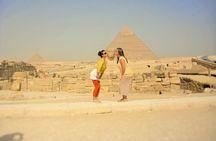 Camel Ride around the Pyramids During Sunrise Or Sunset