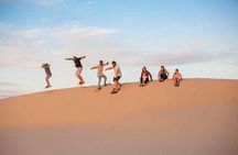 Dubai Morning Desert Quad Bike Tour with Sandboarding & Camel Ride