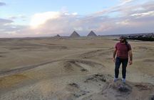 Sunset at Giza pyramids by camel