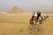 Sunset at Giza pyramids by camel