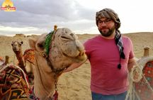 Sunset at Giza pyramids by camel