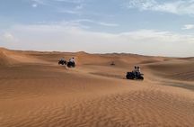 Dubai: Unique SUNSET Quad Bike Red Dunes Safari 