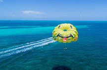 Fly Above Cancun Bay: Parasailing Experience