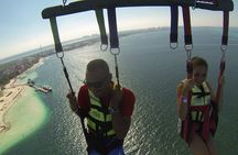 Fly Above Cancun Bay: Parasailing Experience