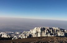 7 Days climb Mt Kilimanjaro through Machame Route price per day per pax
