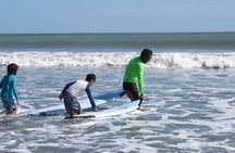 Surf lesson & Beach day in Playa Caracol