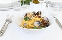 Dining Experience at a local's Home in Livorno with Show Cooking