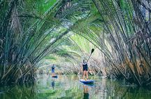 Paddling to explore the historic Vietnam War Rach Chiec jungle, 