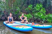 Paddling to explore the historic Vietnam War Rach Chiec jungle, 