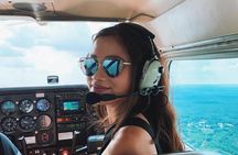 Fly around Paris with a local pilot 