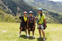 PARAGLIDING over giant waterfalls private tour (optional Guatape) from Medellin