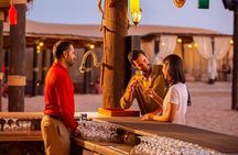 Dubai Evening Desert Safari: Sandboarding, BBQ, Camel Ride & more