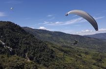 Fun RAFTING + Awesome PARAGLIDING over giant waterfalls from MEDELLIN