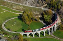 Bernina train and Swiss Alps. Departure from Desenzano