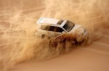 Morning Red Dunes Safari: Quad Biking, Sandboarding & Camel Ride