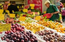 Local market visit and private cooking class at a Cesarina's home in Perugia