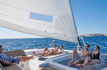 Santorini Gold Catamaran Cruise with BBQ, Drinks and Hotel Pickup