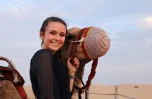 Dubai: Quad Bike Tour with Camel Ride, Sand Boarding & BBQ