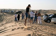 Exclusive Sunrise Desert Safari with Camel Ride Sand Boarding Dune Bashing
