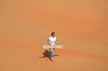 Exclusive Sunrise Desert Safari with Camel Ride Sand Boarding Dune Bashing