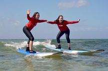 Surf with ALOHA SURF SCHOOL