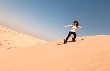 Abu Dhabi Desert safari with BBQ Dinner,Sandboarding & Camel ride