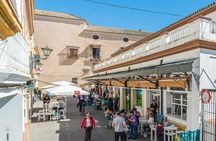 Discover the markets of Seville by bike and try their most typical products!