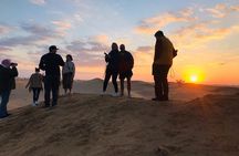 Sunrise Desert Safari with Quad bike and Sandboarding,