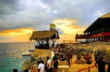 Blue Hole Mineral Spring, Ricks Cafe, 7 Mile Beach and Shopping Private Tour