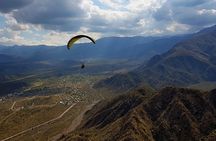 Paragliding free flight experience over the pre-range