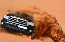 Desert Safari 4x4 Drive With Camel Ride,Belly DanceTanura & Fire Show BBQ Dinner