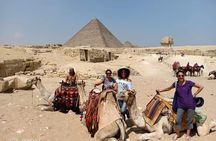 Explore Giza Pyramids & Sphinx with a camel trip