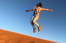 Desert Tour with Sand Boarding & Camel Riding