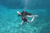 Santorini Sea Caves Kayak Trip with Snorkeling & Picnic