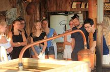 Guided tour of an ancestral Mezcal distillery with transport