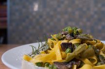 Dining experience at local's home in Savona with cooking demo