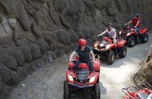 Jungle ATV Quad Bike Through Gorilla Face Cave
