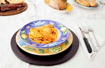 Dining experience at local's home in Savona with cooking demo