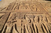 Transfer to Luxor from Aswan and visit Kom Ombo and Edfu Temples