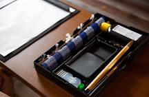 Calligraphy experience with simple kimono in Okinawa