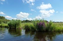 Fresh nose tour with the canoe through the nature near Amsterdam