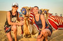 Abu Dhabi: Desert Safari with BBQ, Camel Ride & Sandboarding