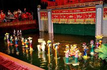3-hour Dinner cruise on Saigon river plus Cyclo & Water puppet show evening