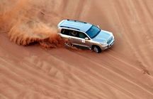 Dubai Camel Riding Sandboarding and Dune Bashing Experience