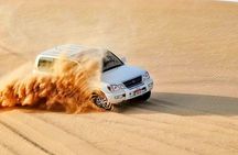Red Dunes , Sandboarding, Camel Ride & BBQ at Al Khayma Camp