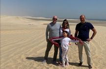 Doha : Half Day Desert Safari With SandBoarding and Camel Ride