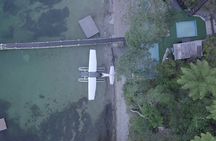 Crater Lakes Scenic Flight with Natural Hot Pool Bathing by Floatplane