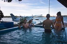 Crater Lakes Scenic Flight with Natural Hot Pool Bathing by Floatplane